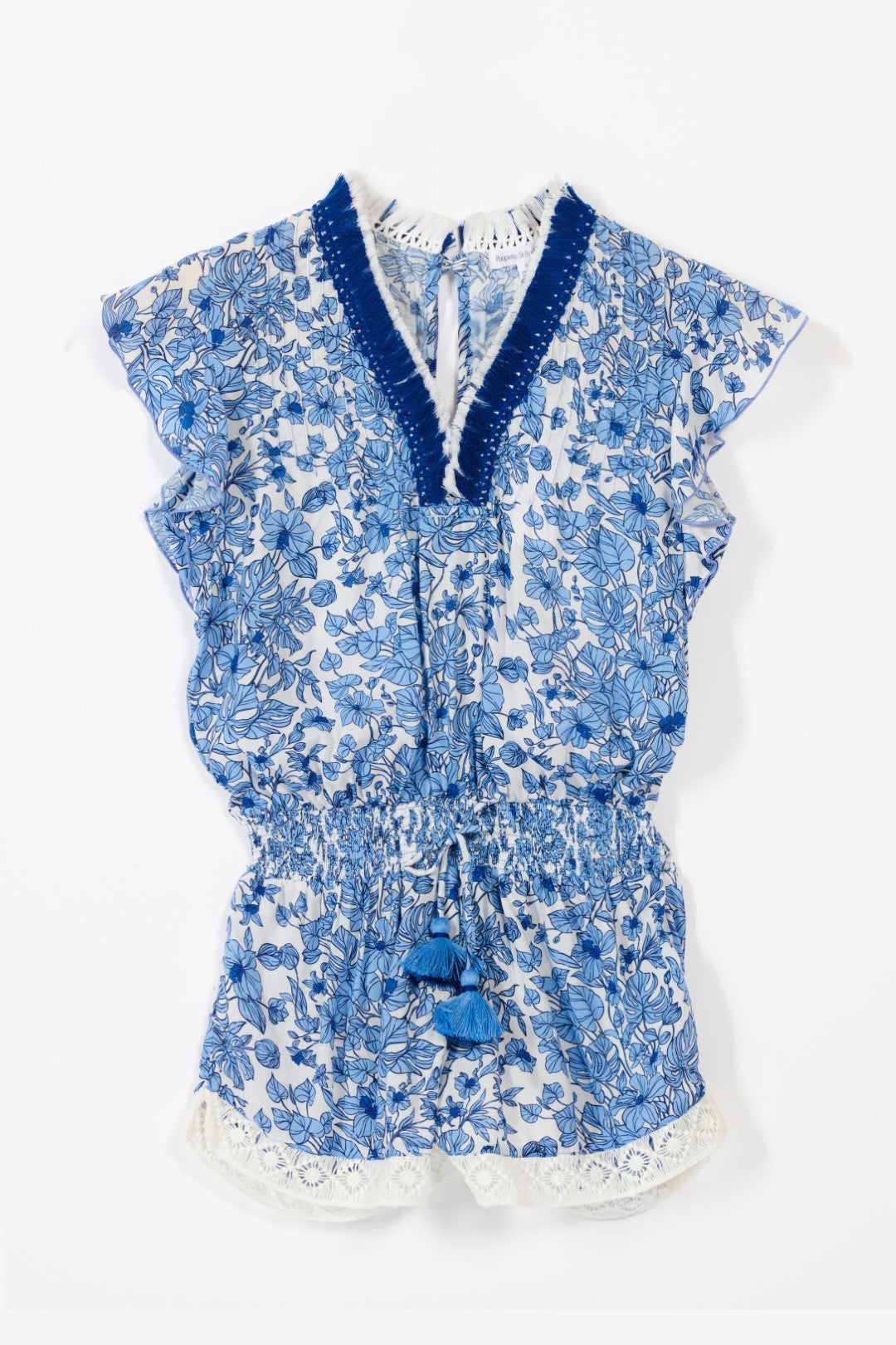 Girls' Blue Aquaflora jumpsuit – Short Jumpsuit Sasha by Poupette St Barth, flat lay showing V-neck trim and lace hem
