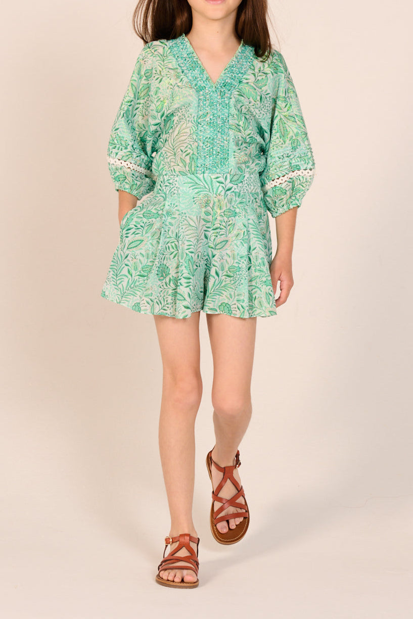 Green Palmarosa cotton short jumpsuit for girls by Poupette St Barth, featuring metallic accents and a comfortable fit.
