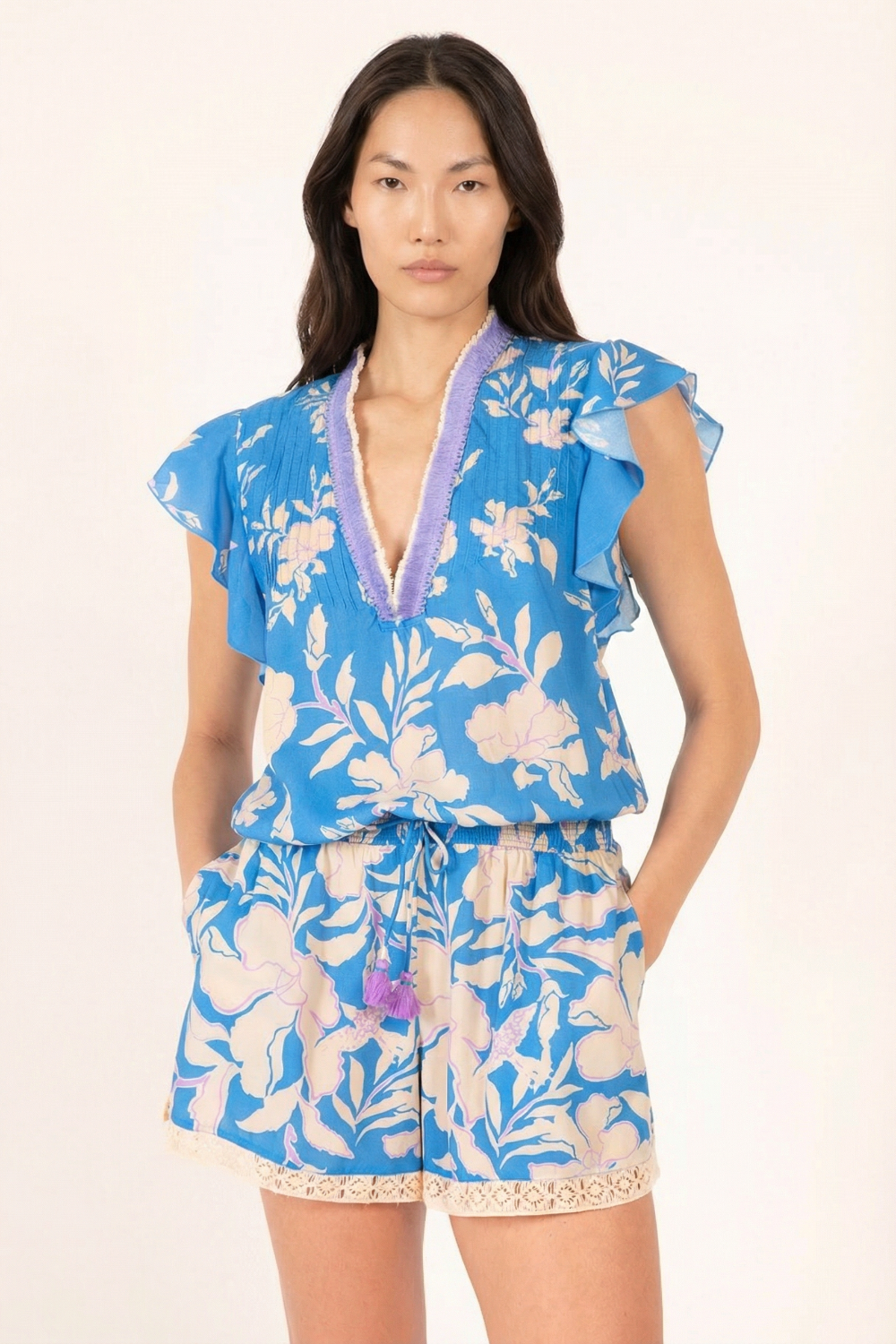 Blue palm print short jumpsuit Sasha by Poupette St Barth, featuring a relaxed fit and stylish summer design.
