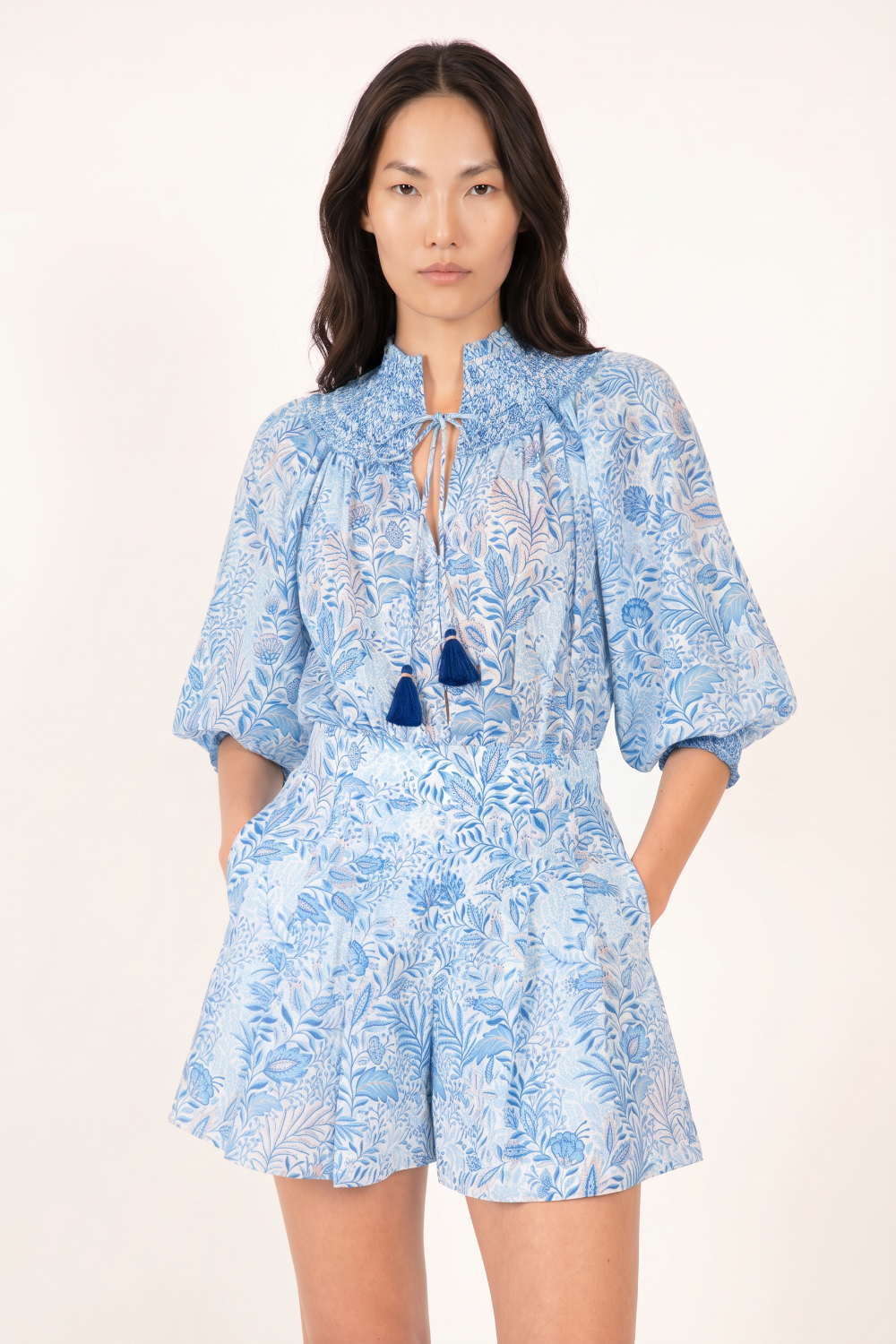 Blue Palmarosa short jumpsuit by Poupette St Barth featuring a fitted waist and relaxed fit, perfect for casual summer wear.