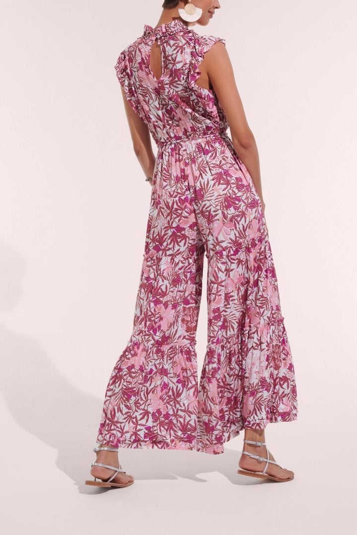 Pink orchid long jumpsuit by Poupette St Barth, featuring a stylish, flowy design with wide legs and a fitted bodice.