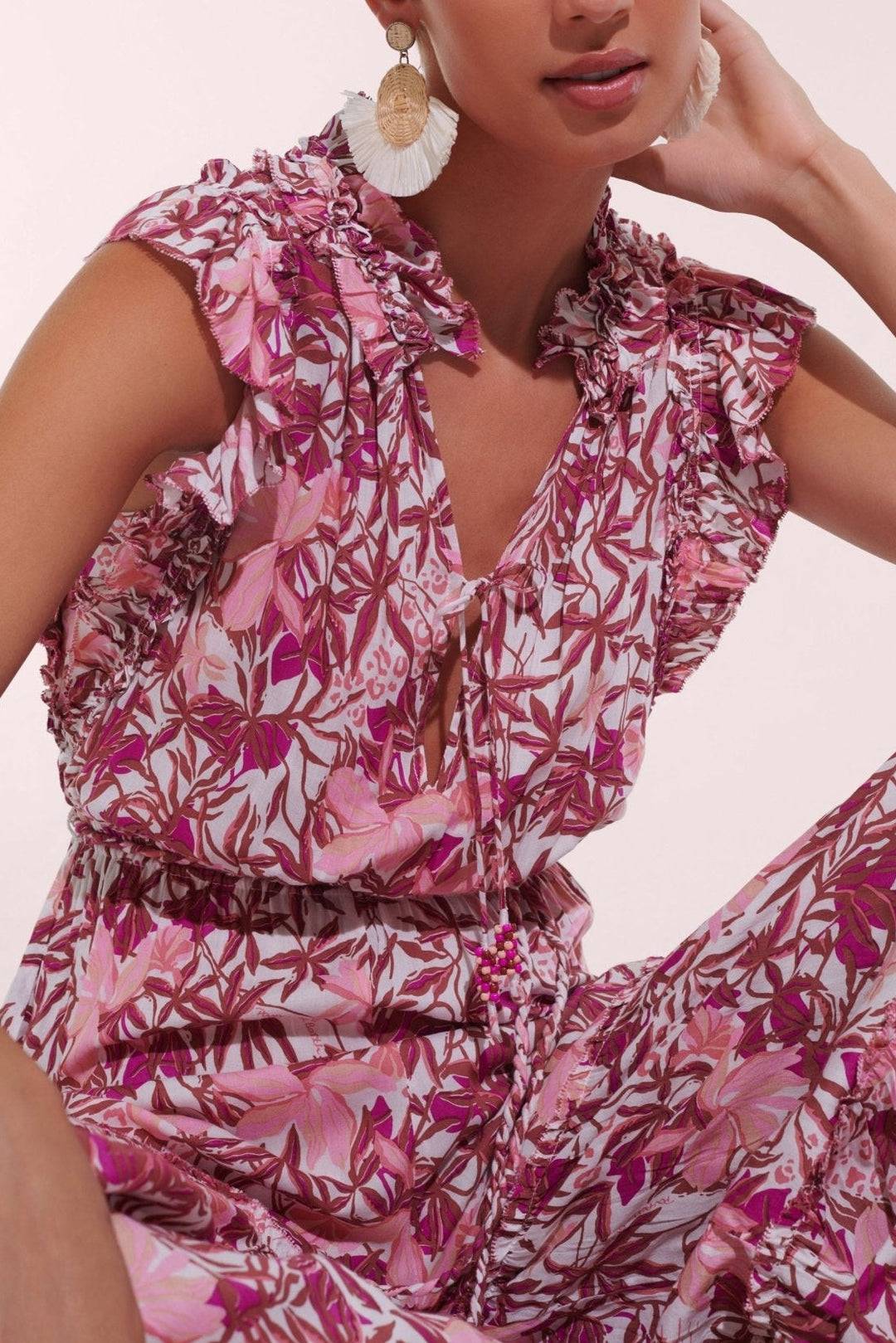 Pink orchid long jumpsuit from Poupette St Barth, featuring a stylish, flowing design with wide legs and sleeveless cut.