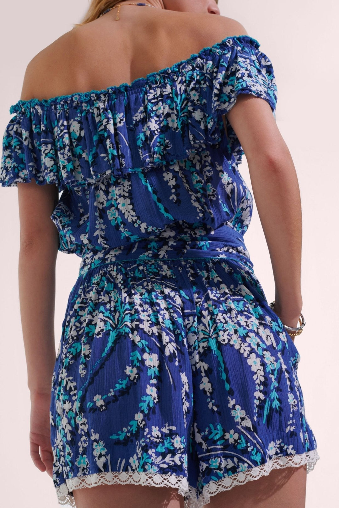 Poupette St Barth Short Jumpsuit Bella in Royal Palmery fabric, stylish sleeveless design with a relaxed fit and tropical pattern.