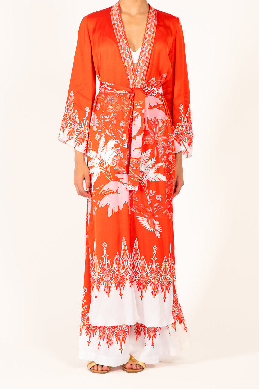 Poupette St Barth Kimono Lea in Coral Canopy, lightweight satin cover-up with floral pattern, worn as stylish beach or lounge wear.