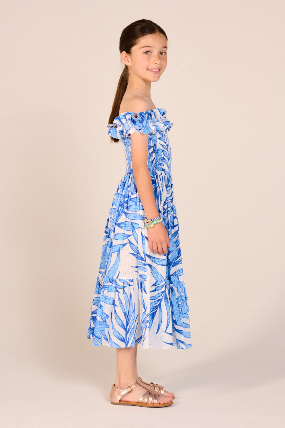 Girls' Blue Palm Leaf long dress – Long Dress Suzanne by Poupette St Barth, side view of the midi length