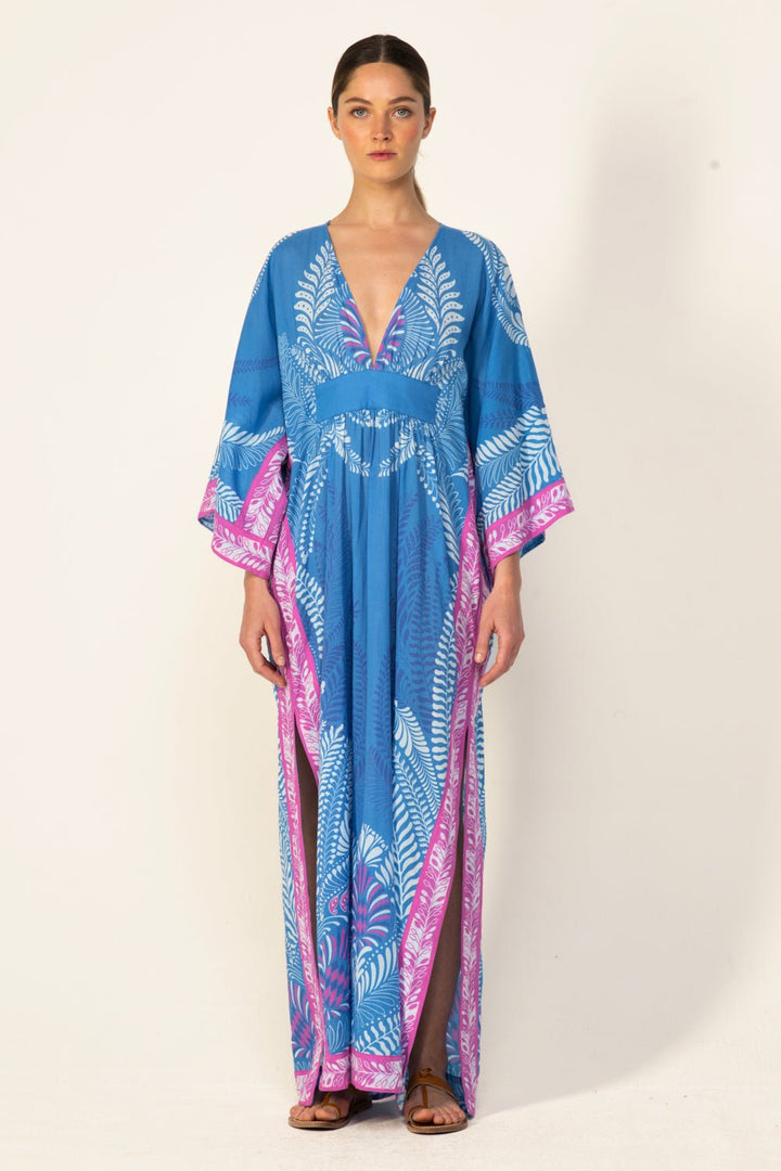 Blue Oolong long kaftan dress by Poupette St Barth featuring flowing fabric and elegant design.