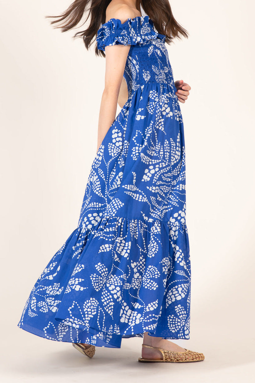 Blue Suzanne long dress by Poupette St Barth, lightweight cotton fabric, flowing design, shown in a full-length view.