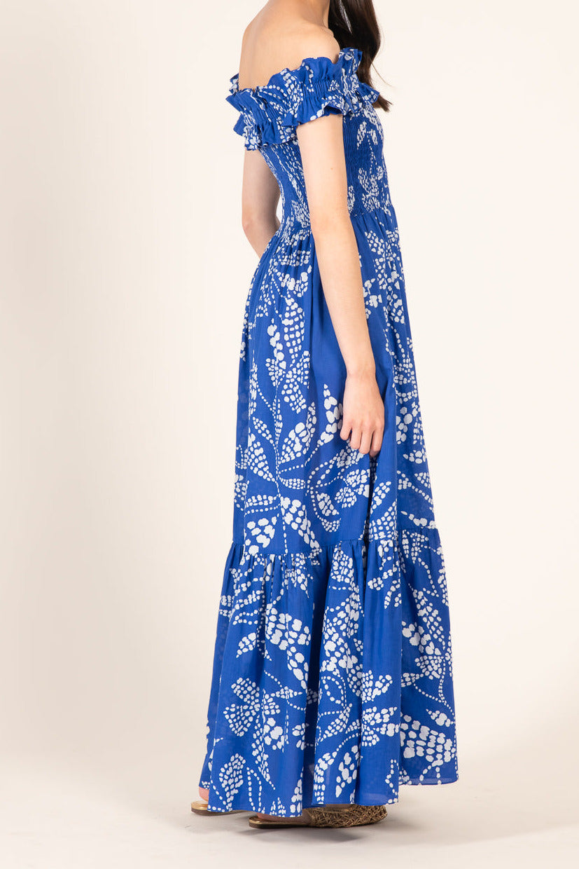 Blue cotton Long Dress Suzanne by Poupette St Barth, featuring a flowy fit and elegant design, shown on a model.