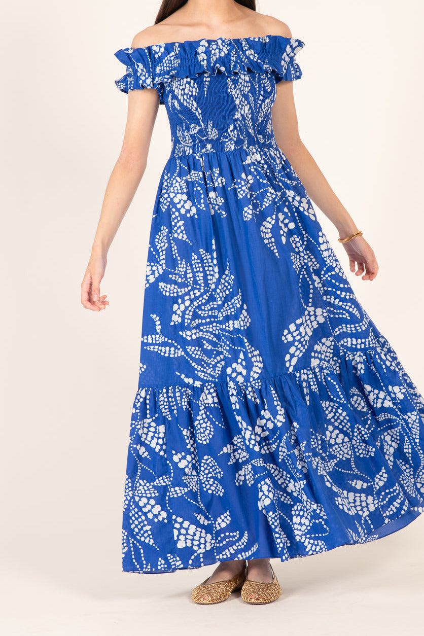 Blue Austral Long Dress Suzanne by Poupette St Barth, lightweight cotton fabric, elegant and flowy design, close-up view of the dress.