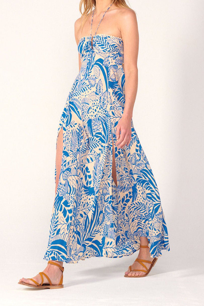 Blue long dress Carla by Poupette St Barth featuring a vibrant toucan print, flowing viscose fabric, and elegant floor-length design.