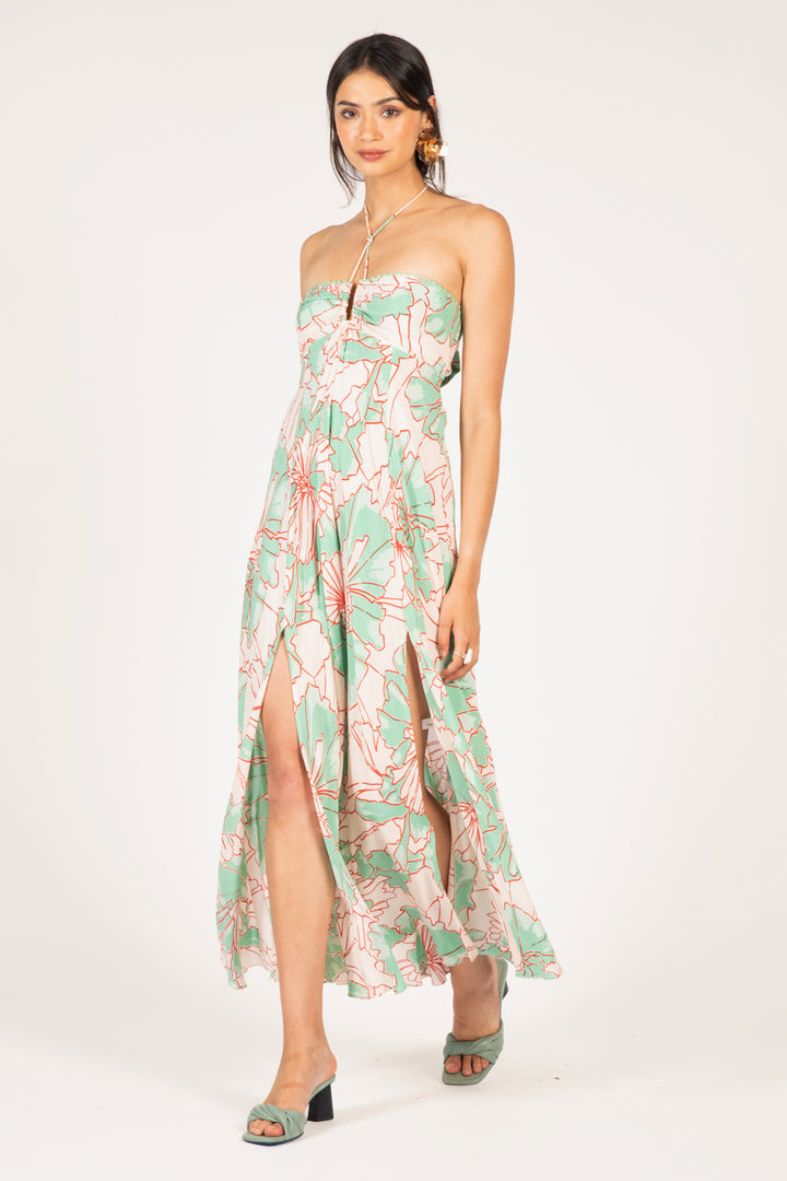 Elegant green petal long dress by Poupette St Barth, flowing fabric and stylish design perfect for summer occasions.