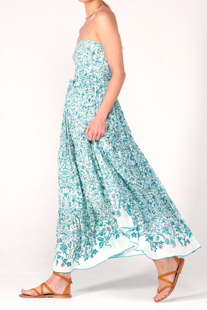 Green Tiare long dress – Long Dress Thelma by Poupette St Barth, walking side view with flowing tiered skirt