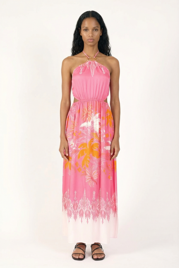 Pink long dress from Poupette St Barth Isore collection, flowing fabric with a canopy design, perfect for warm-weather occasions.