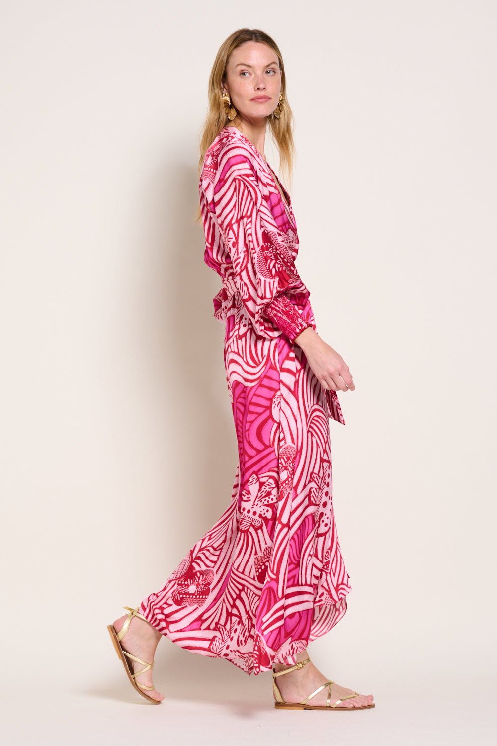 Pink long dress Kristen by Poupette St Barth featuring flowing fabric and elegant design, perfect for stylish occasions.
