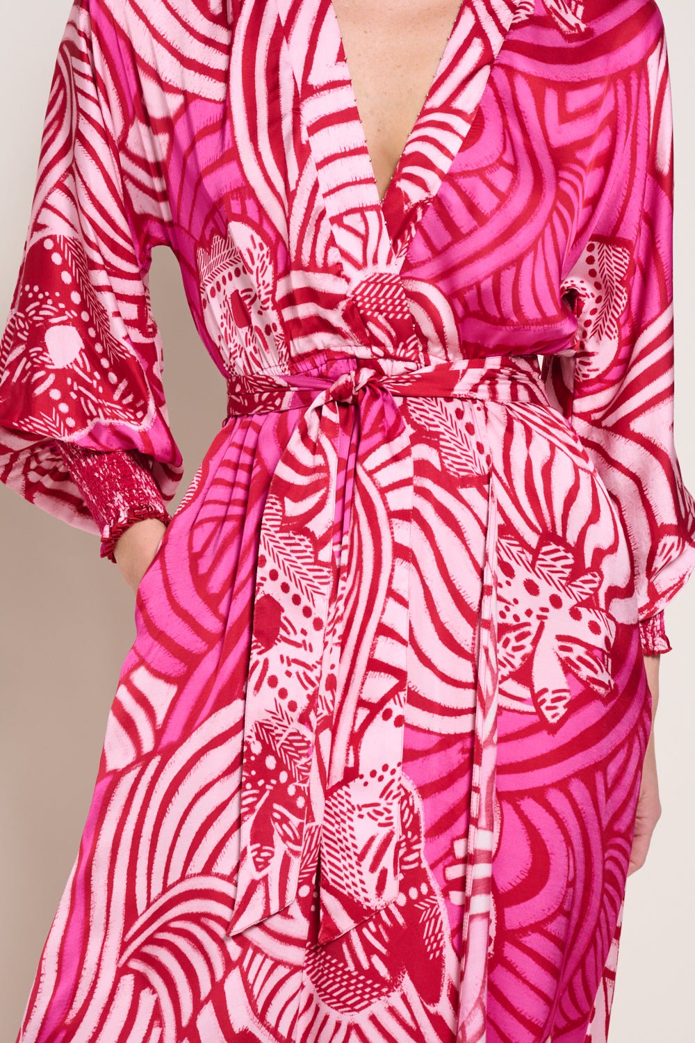 Pink long dress Kristen by Poupette St Barth featuring flowing fabric and elegant design.