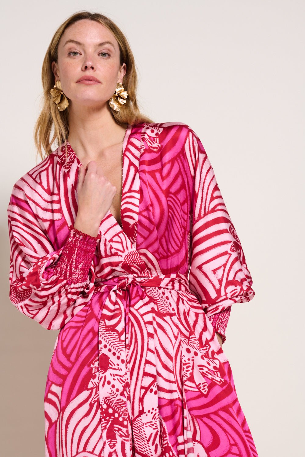 Pink long dress Kristen by Poupette St Barth, featuring elegant flowy fabric and stylish design, perfect for summer occasions.