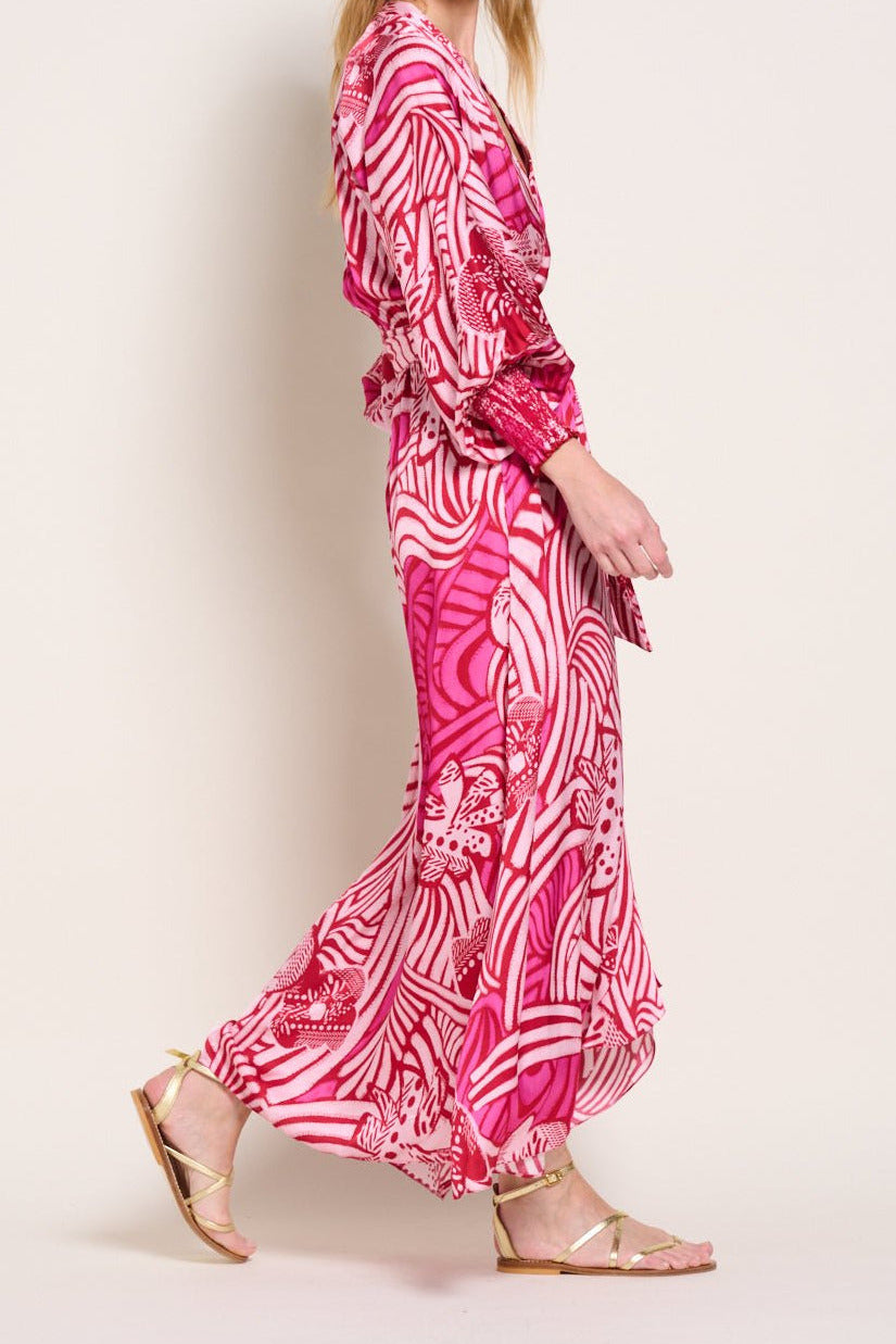 Pink Japonism long dress – Long Dress Kristen by Poupette St Barth, walking side view with flowing skirt