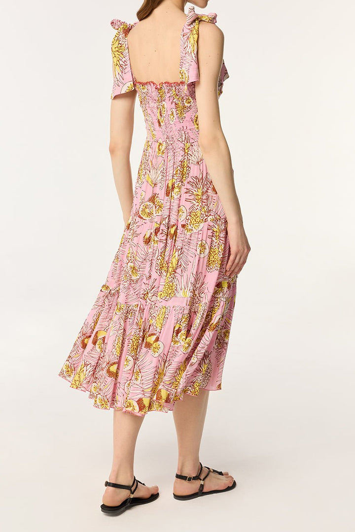 Pink Triny long dress by Poupette St Barth featuring a flowing silhouette and vibrant karibia print.