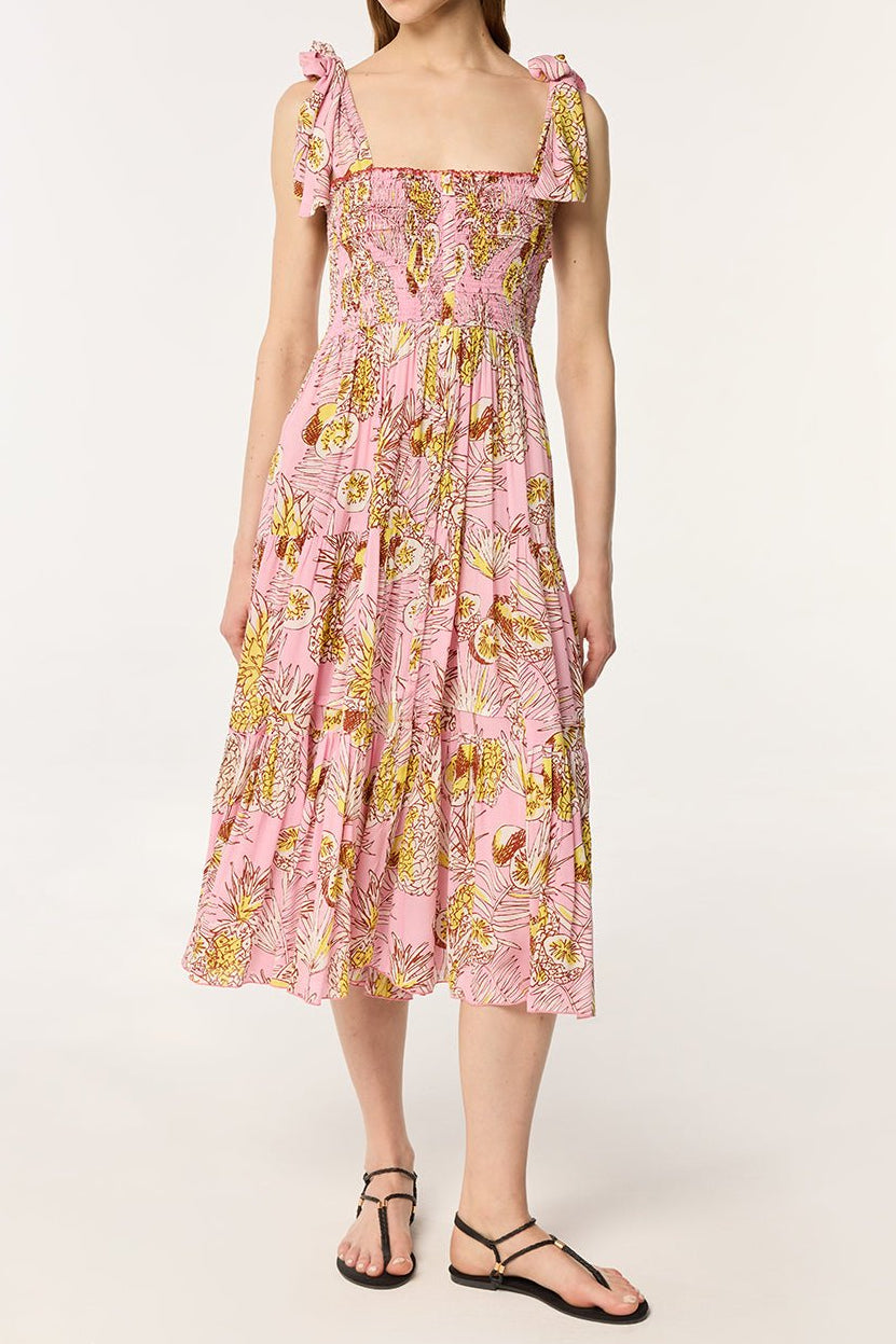 Pink long dress from Poupette St Barth's Triny Karibia collection, featuring a flowing style and elegant design.