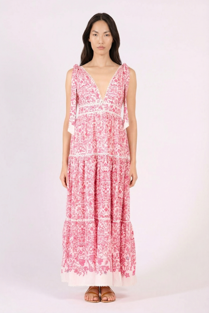 Pink long dress called Perla by Poupette St Barth, featuring flowing fabric and elegant design.