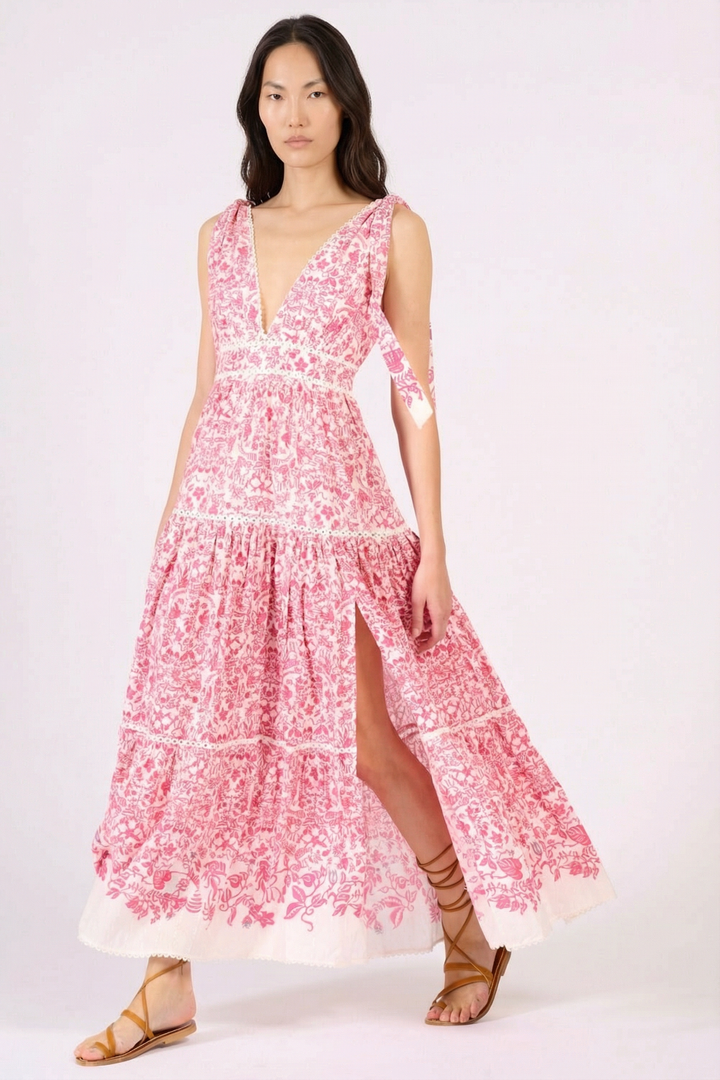 Pink Long Dress Perla by Poupette St Barth featuring flowing fabric and elegant design, perfect for summer occasions.