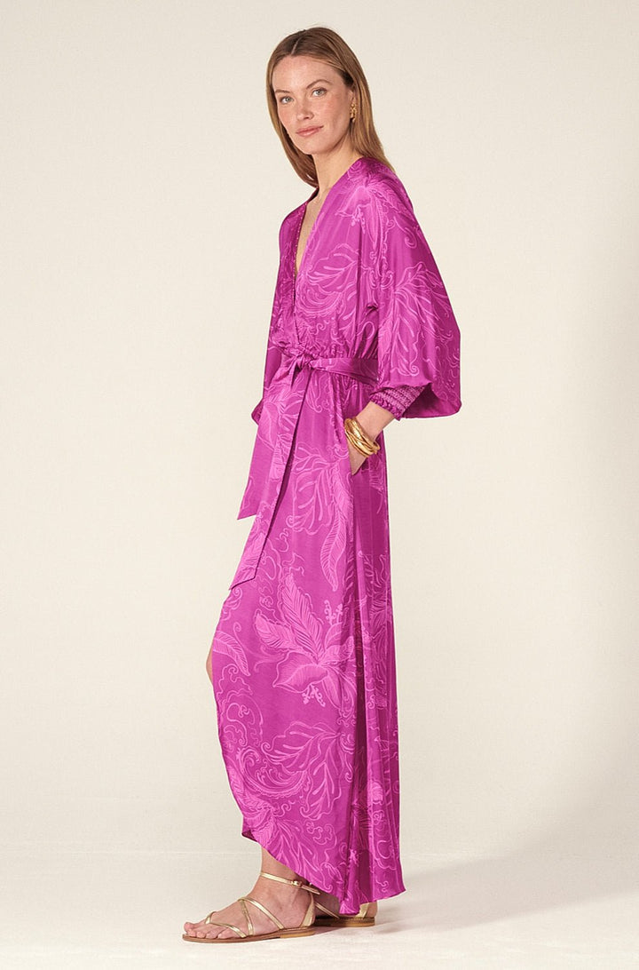 Poupette St Barth Kristen long dress in purple reef fabric, flowing style with a fitted waist and elegant neckline.