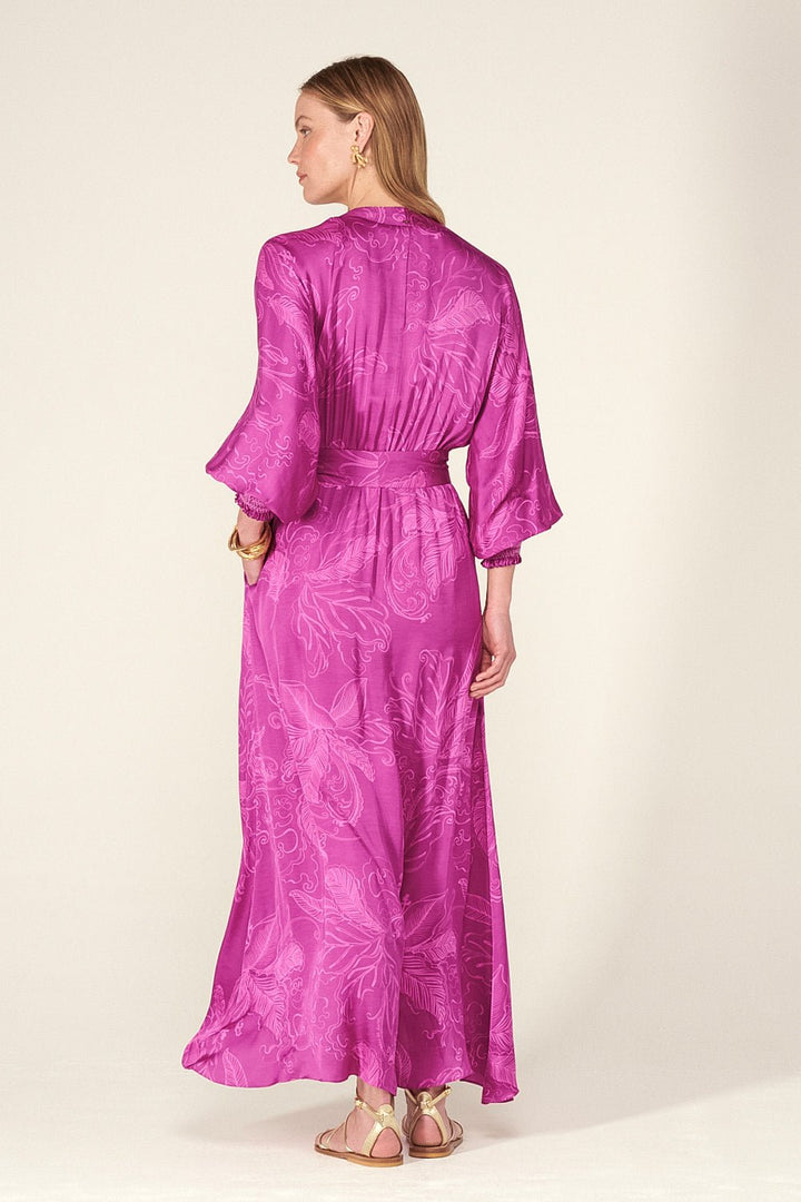 Purple reef long dress by Poupette St Barth, featuring a flowy silhouette and elegant design, shown in the image.
