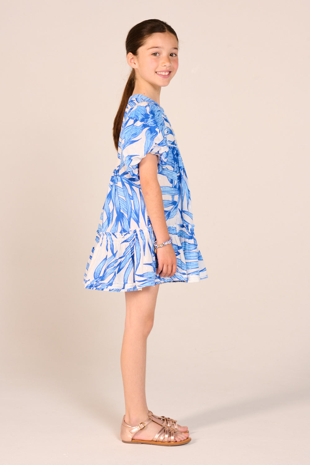 Girls' Mini Dress Cruz by Poupette St Barth in blue palm leaf print, featuring a stylish and comfortable design for warm weather.