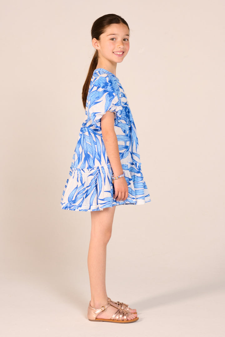 Girls' Mini Dress Cruz by Poupette St Barth in blue palm leaf print, featuring a stylish and comfortable design for warm weather.