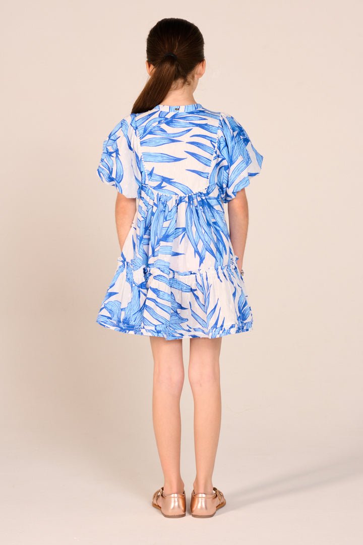 Blue palm leaf mini dress for girls by Poupette St Barth, featuring a stylish and lightweight design for warm weather.