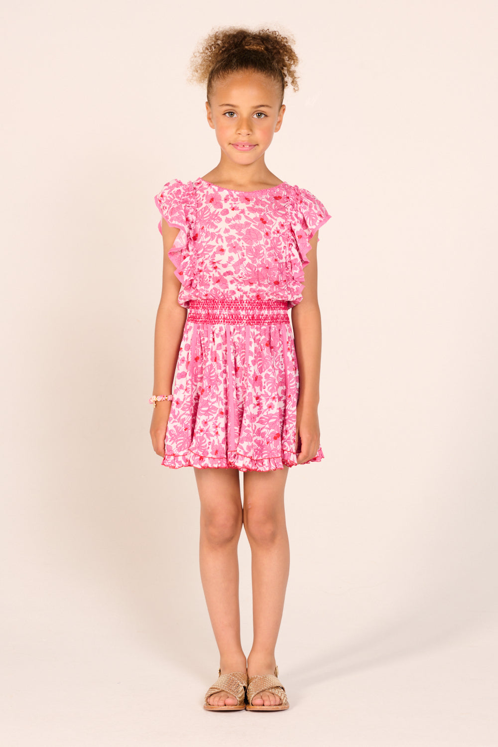 Pink aquaflora mini dress for girls by Poupette St Barth, featuring a playful floral design and lightweight fabric.