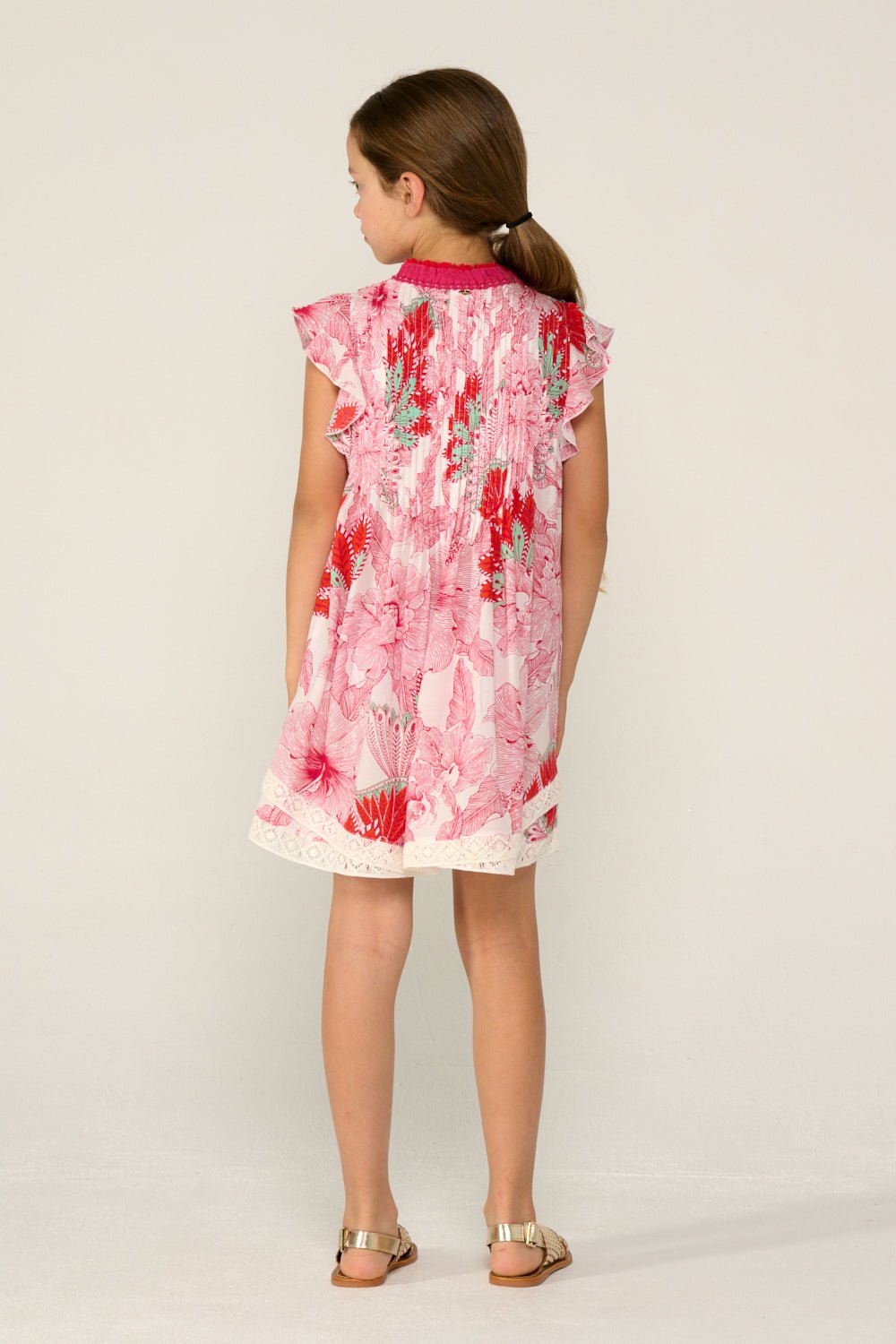Girls' Pink Padang mini dress – Mini Dress Sasha by Poupette St Barth, back view showing the lace trim at the hem