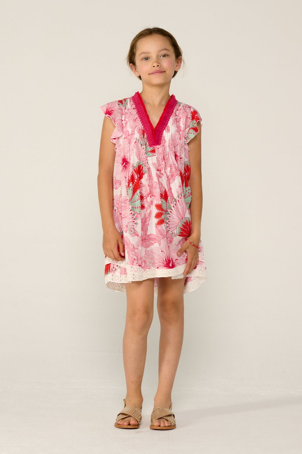 Girls' Pink Padang mini dress – Mini Dress Sasha by Poupette St Barth, front view with flutter sleeves and lace hem