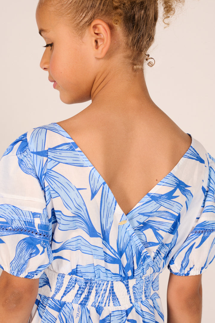 Blue palm leaf mini dress for girls by Poupette St Barth featuring a stylish, lightweight design perfect for warm weather.