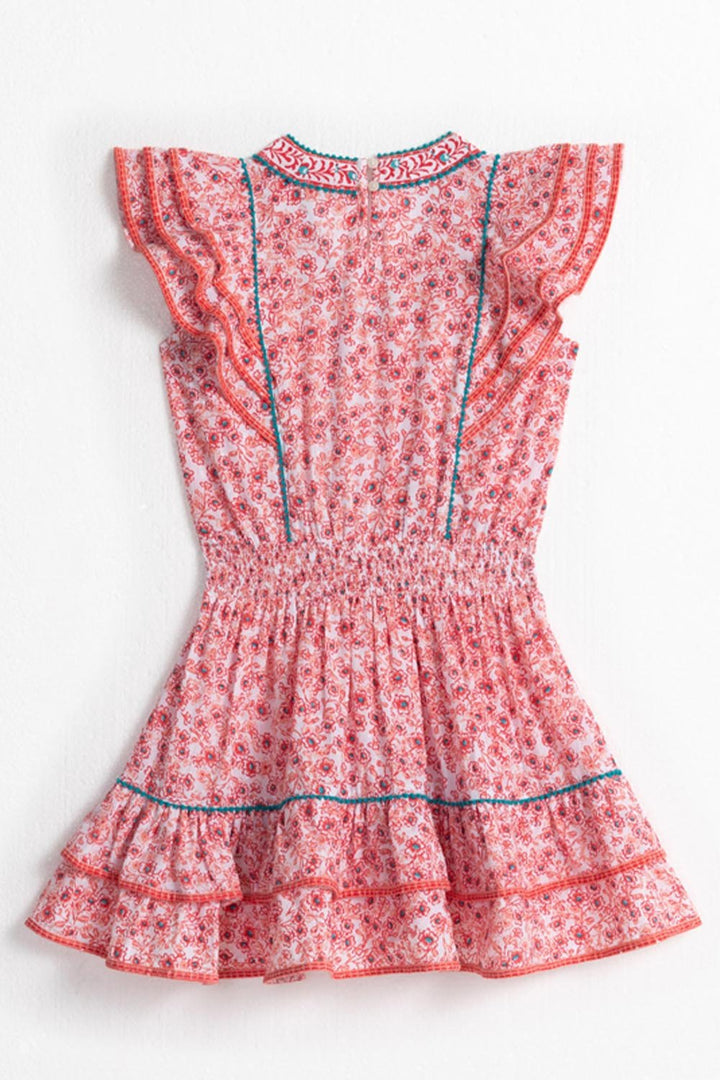 Back view of Poupette St Barth Kids Mini Dress Camila in pink anemone, lightweight with ruffled sleeves and playful floral print.