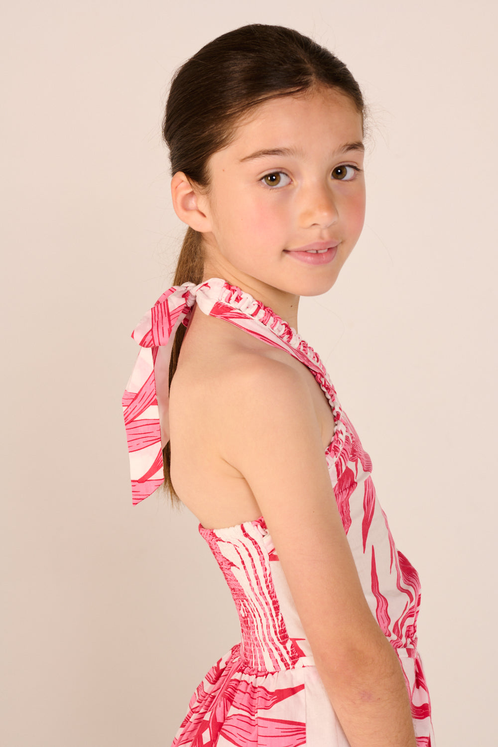 Pink palm leaf Mini Dress Manon for girls by Poupette St Barth, featuring a stylish and comfortable design.