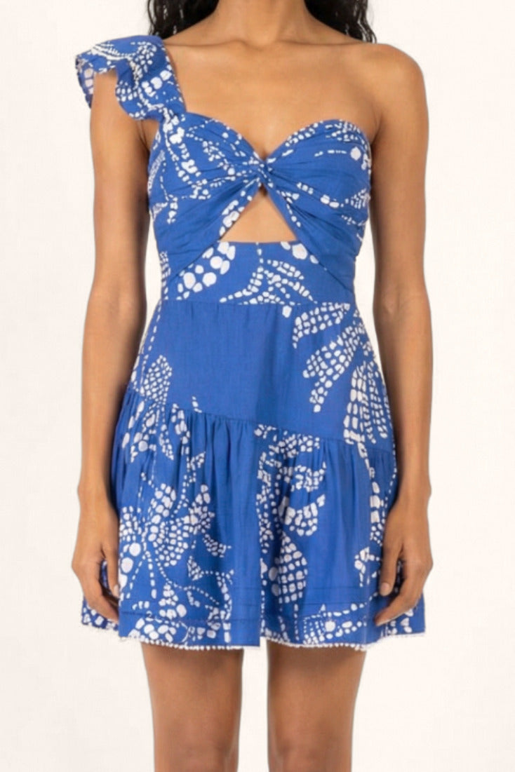 Blue Austral mini dress – Mini Dress Niki by Poupette St Barth, front view with one-shoulder ruffle strap and cutout