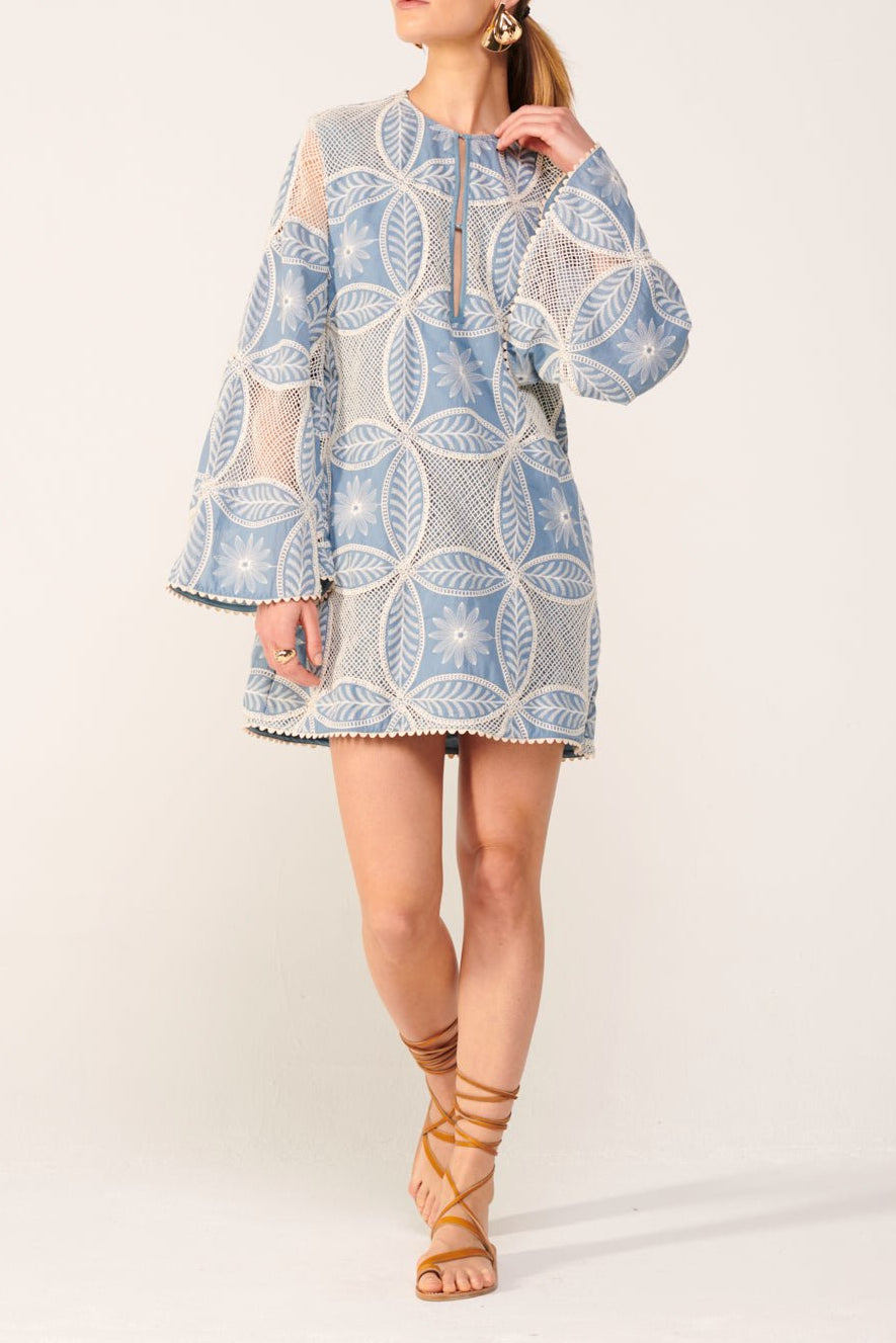 Blue Gia Mini Dress by Poupette St Barth featuring eyelet cotton fabric and a mandala pattern, perfect for casual summer wear.