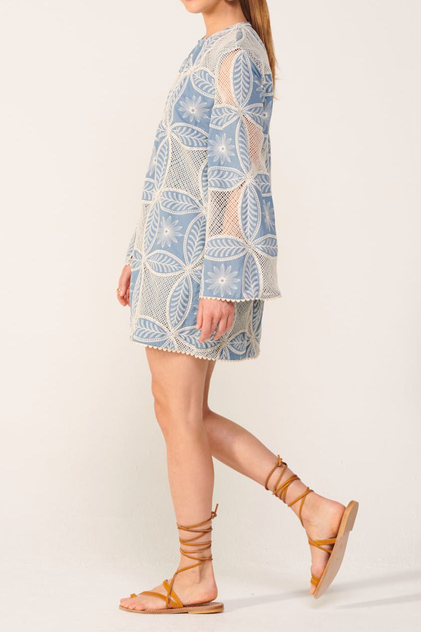 Blue Poupette St Barth Gia Mini Dress with eyelet cotton fabric, featuring a mandala pattern and a flattering mini length.