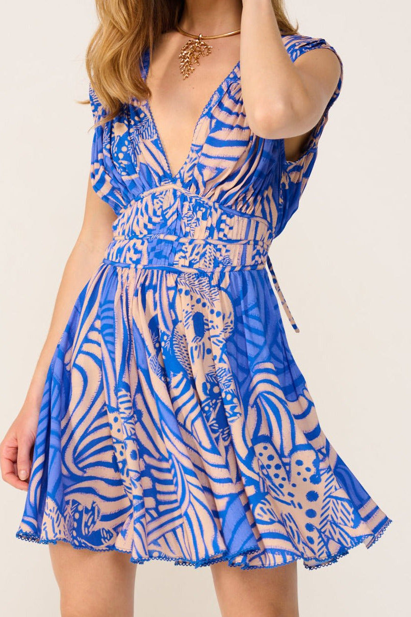 Blue Japonism mini dress – Mini Dress Ciao by Poupette St Barth, front view with deep V-neck and smocked waist