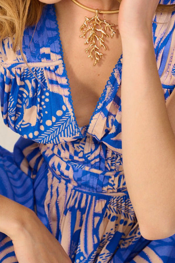 Blue Japonism mini dress – Mini Dress Ciao by Poupette St Barth, close-up of plunging neckline and the print