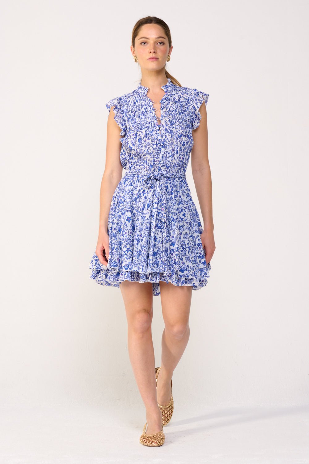 Blue Callie Mini Dress by Poupette St Barth featuring a stylish sleeveless design and lightweight fabric, perfect for warm weather.