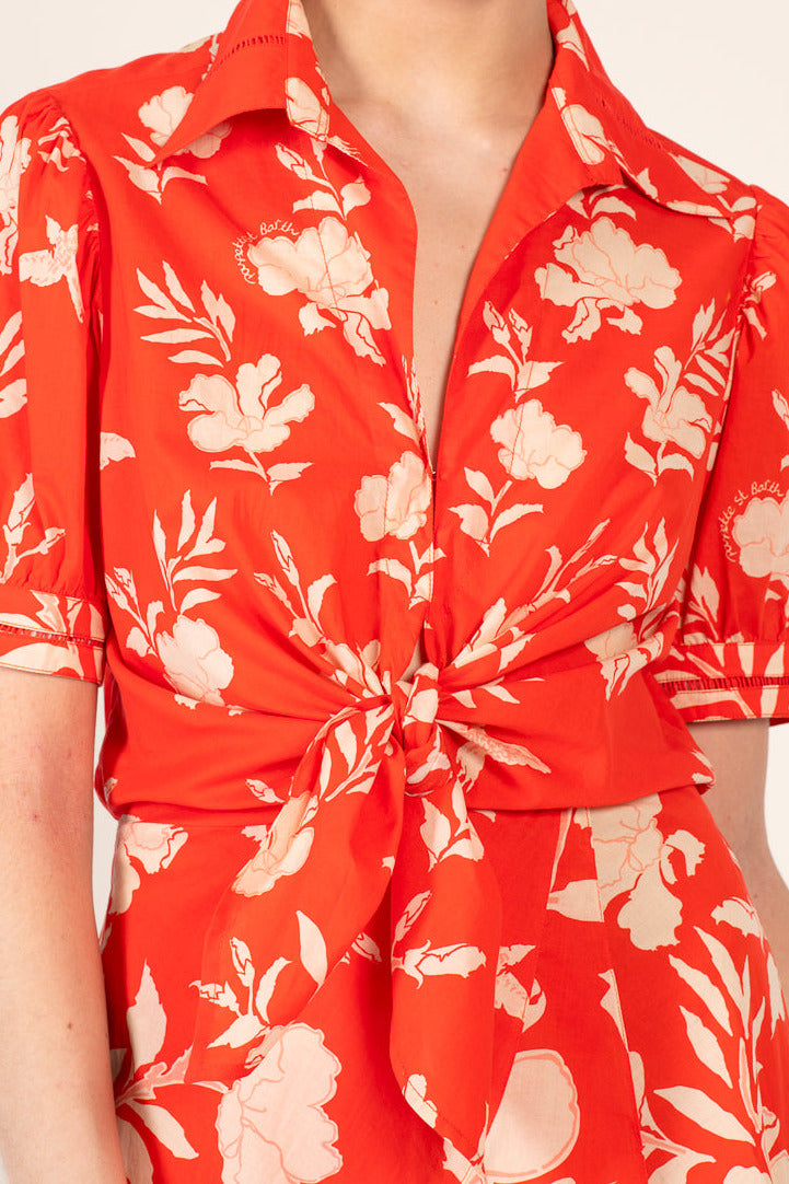 Poupette St Barth Iris Mini Dress in Coral Palm Beach cotton, featuring a stylish mini dress with a tropical print.