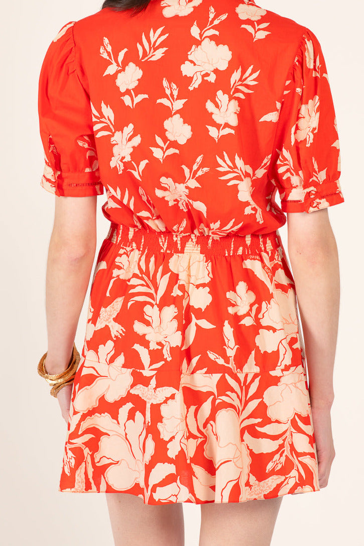 Poupette St Barth Iris Mini Dress in Coral Palm Beach cotton, showing a sleeveless design with tropical print and fitted silhouette.