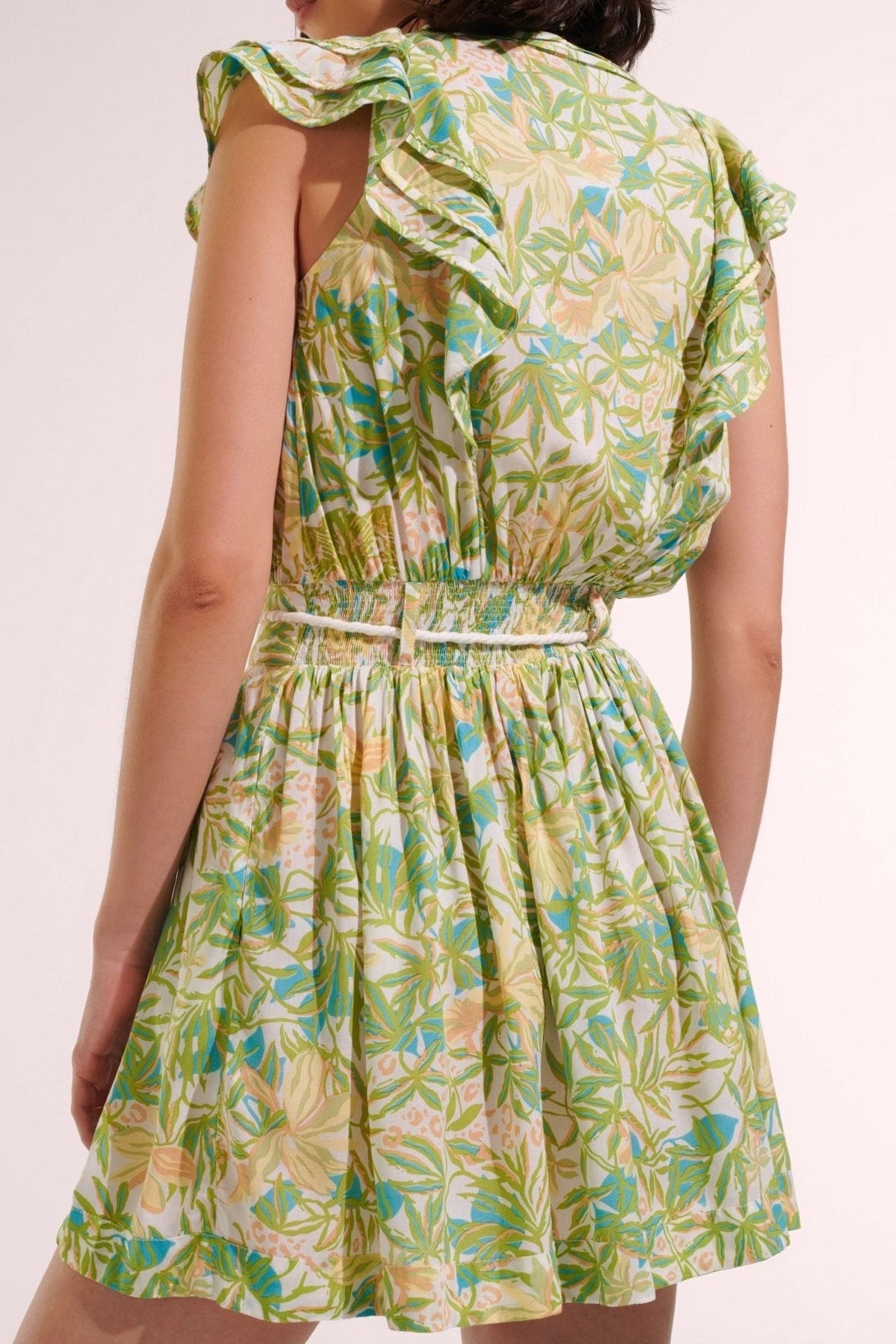 Green Orchid mini dress – Mini Dress Bice by Poupette St Barth, back view showing flutter sleeves and smocked waist