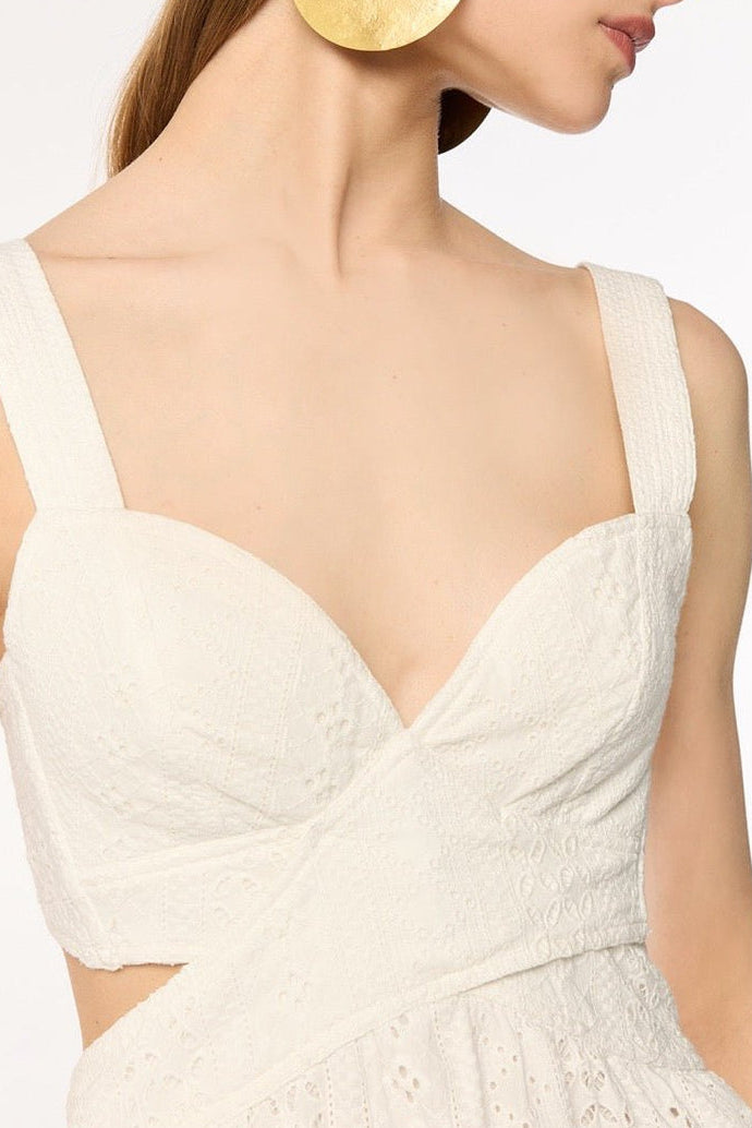 Poupette St Barth Mini Dress Coco in natural white, lightweight and stylish, displayed on a hanger against a neutral background.
