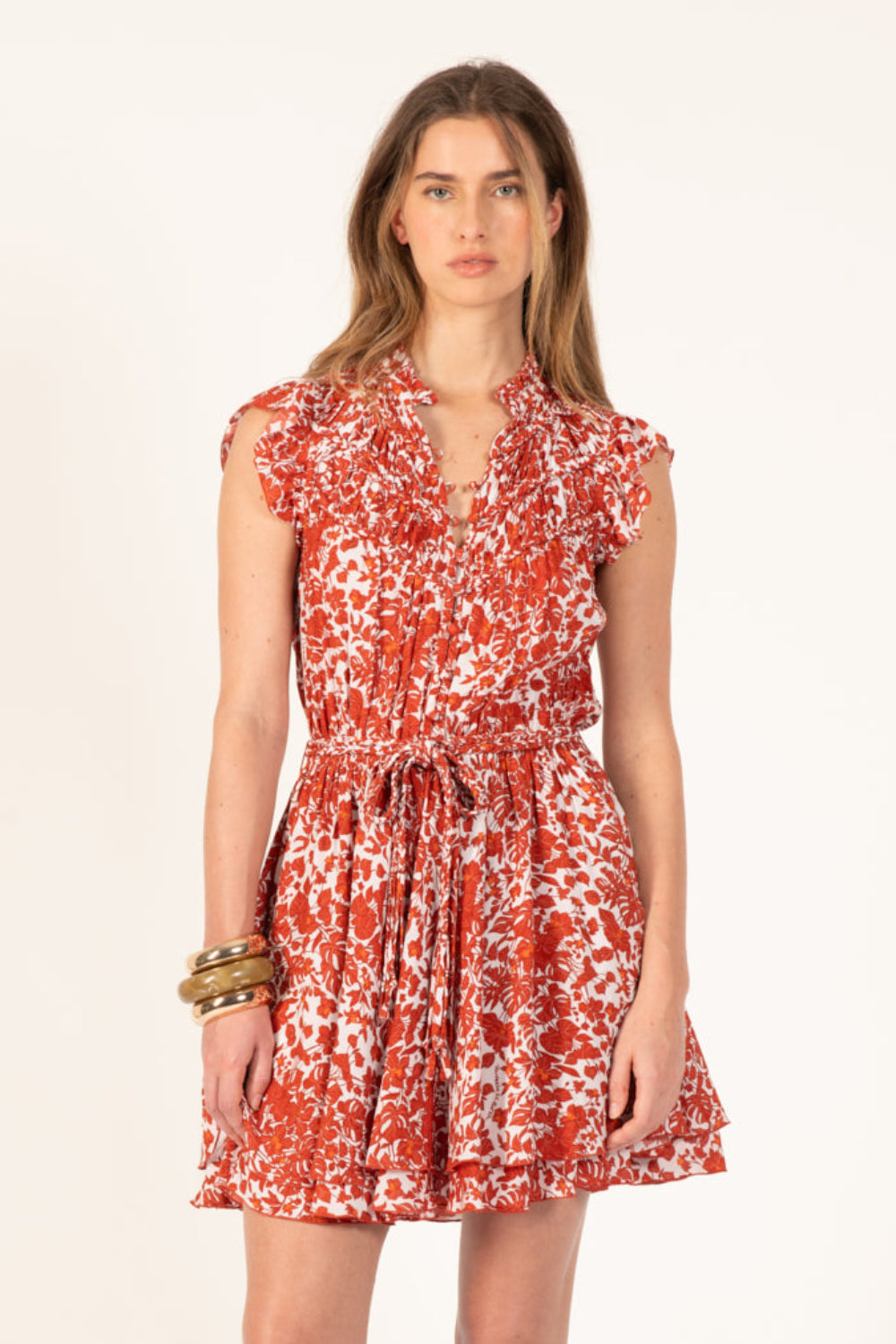 Poupette St Barth Callie Mini Dress in paprika aquaflora with a flowy silhouette and sleeveless design, perfect for warm weather.