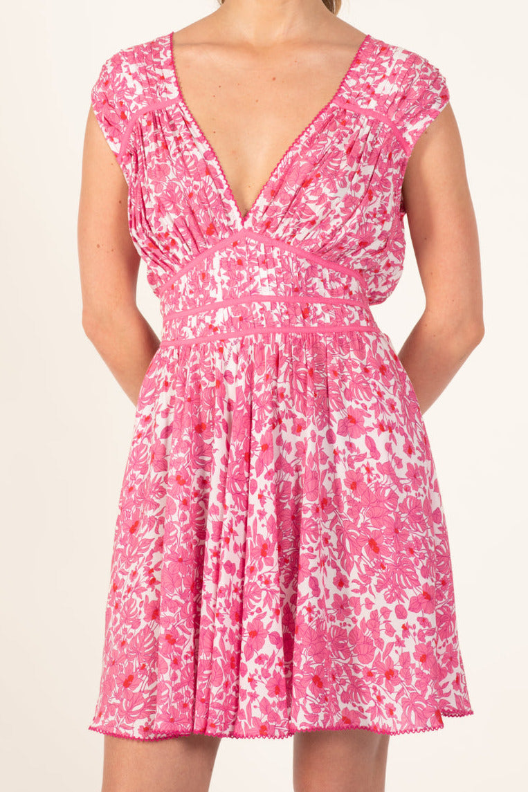 Pink Aquaflora mini dress – Mini Dress Ciao by Poupette St Barth, front view with V-neck and smocked waist