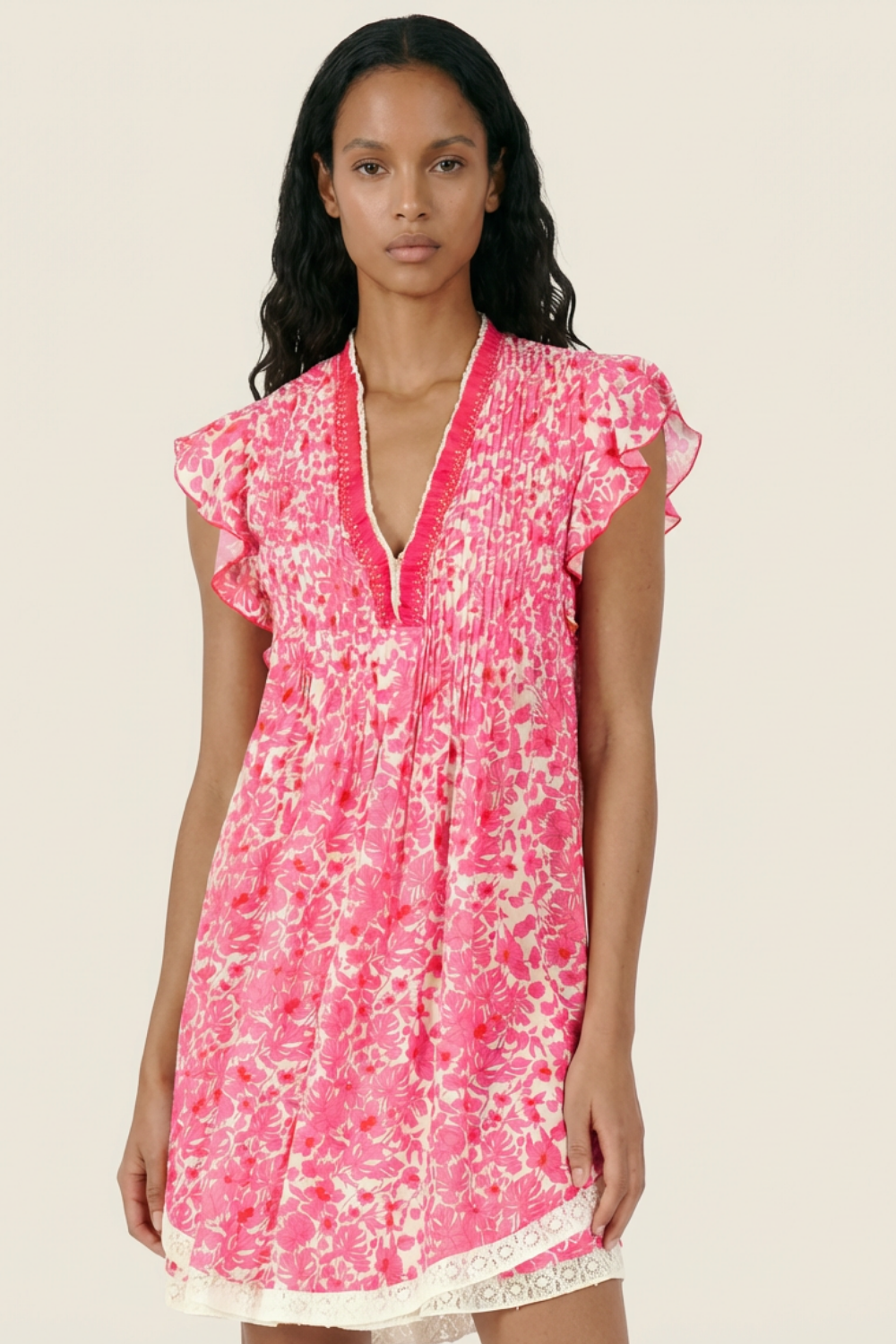 Pink Aquaflora mini dress – Mini Dress Sasha by Poupette St Barth, close-up front view of trimmed v-neck