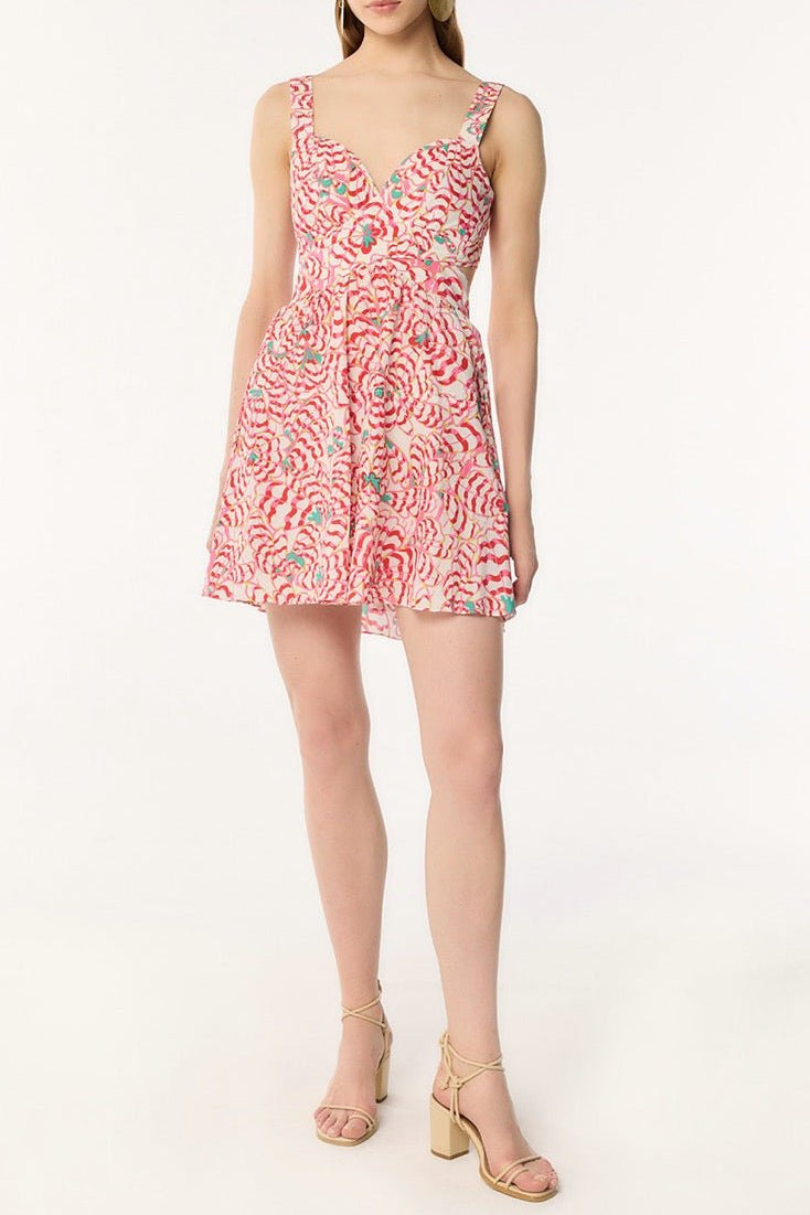 Pink floral mini dress by Poupette St Barth featuring a delicate wing and flower pattern, perfect for summer wear.